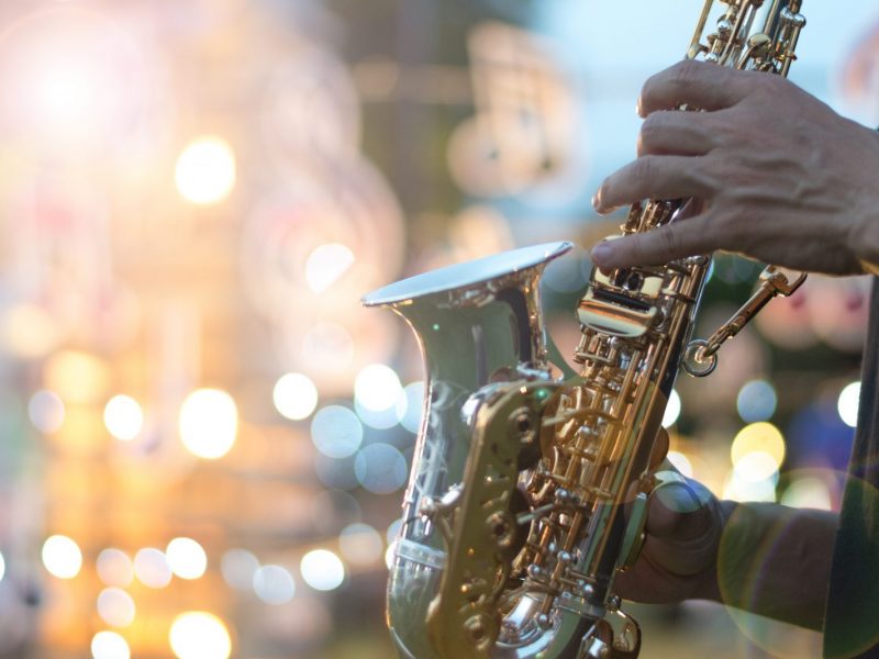 International jazz day and World Jazz festival. Saxophone, music instrument played by saxophonist player musician in fest.