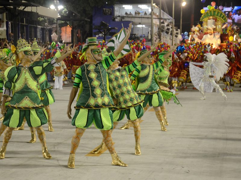 People In Costume Dancing At Carnival