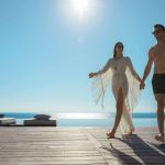 Couple walking by the pool