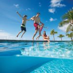 Family playing at the pool