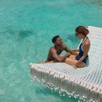 Couple on a hammock at the sea