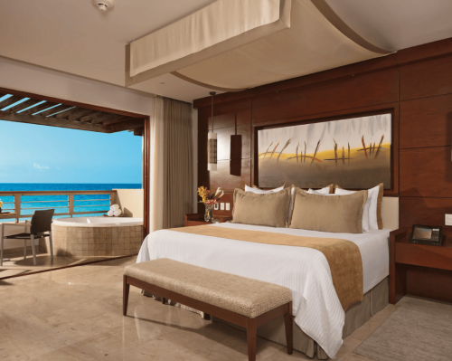 luxury oceanfront hotel suite with king bed and private terrace breathless cabo san lucas resort & spa
